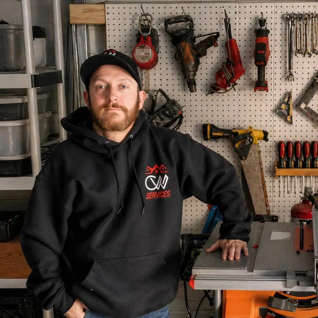 Glenn, co-owner and Construction Supervisor at CW Services LLP, in his Taunton MA shop